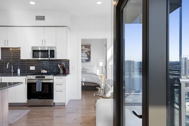 a view of a building with a backyard