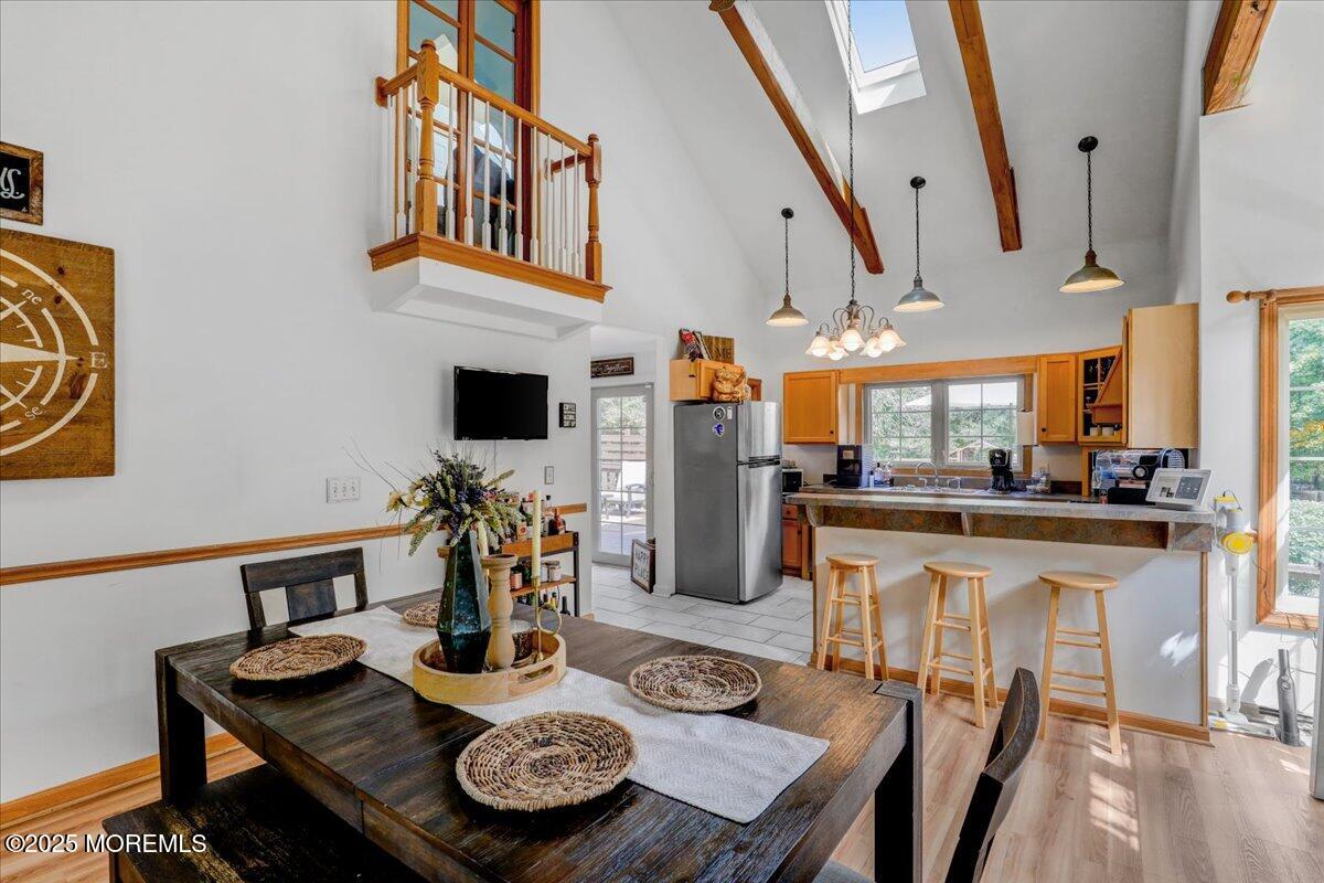 9 Main Street Cream Ridge, NJ 08514 - Photo 15 of 30 a view of a dining room with furniture a rug and wooden floor