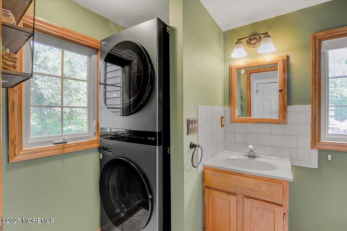 9 Main Street Cream Ridge, NJ 08514 - Photo 17 of 30 a bathroom with a sink a mirror and a window