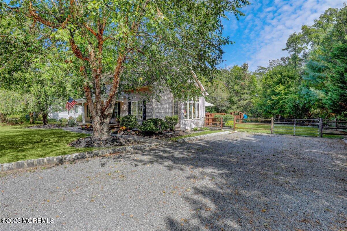 9 Main Street Cream Ridge, NJ 08514 - Photo 2 of 30 a view of a house with a big yard and large trees