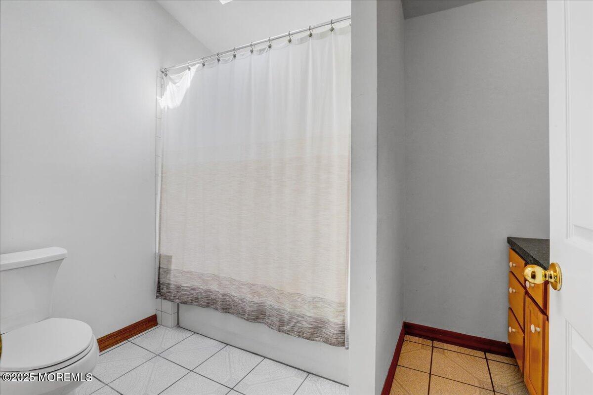 9 Main Street Cream Ridge, NJ 08514 - Photo 24 of 30 a bathroom with a granite countertop shower and a toilet