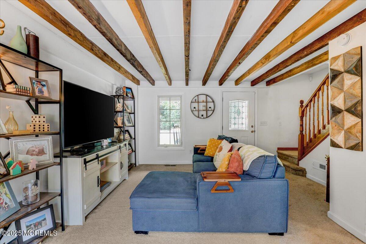 9 Main Street Cream Ridge, NJ 08514 - Photo 7 of 30 a living room with furniture and a flat screen tv