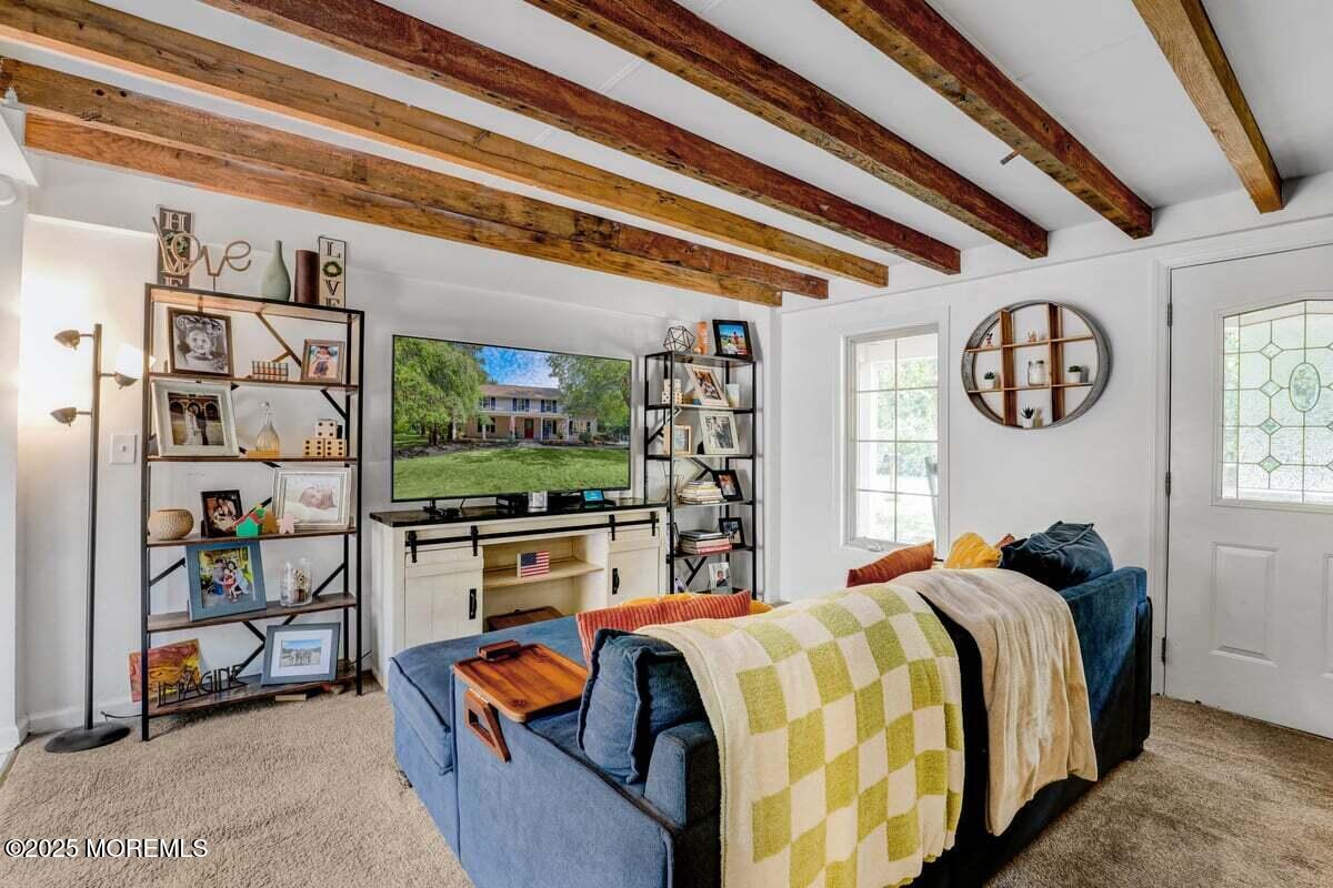 9 Main Street Cream Ridge, NJ 08514 - Photo 9 of 30 a living room with furniture and a flat screen tv