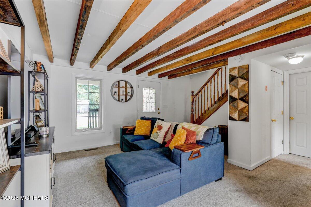 9 Main Street Cream Ridge, NJ 08514 - Photo 10 of 30 a living room with furniture a rug and a window