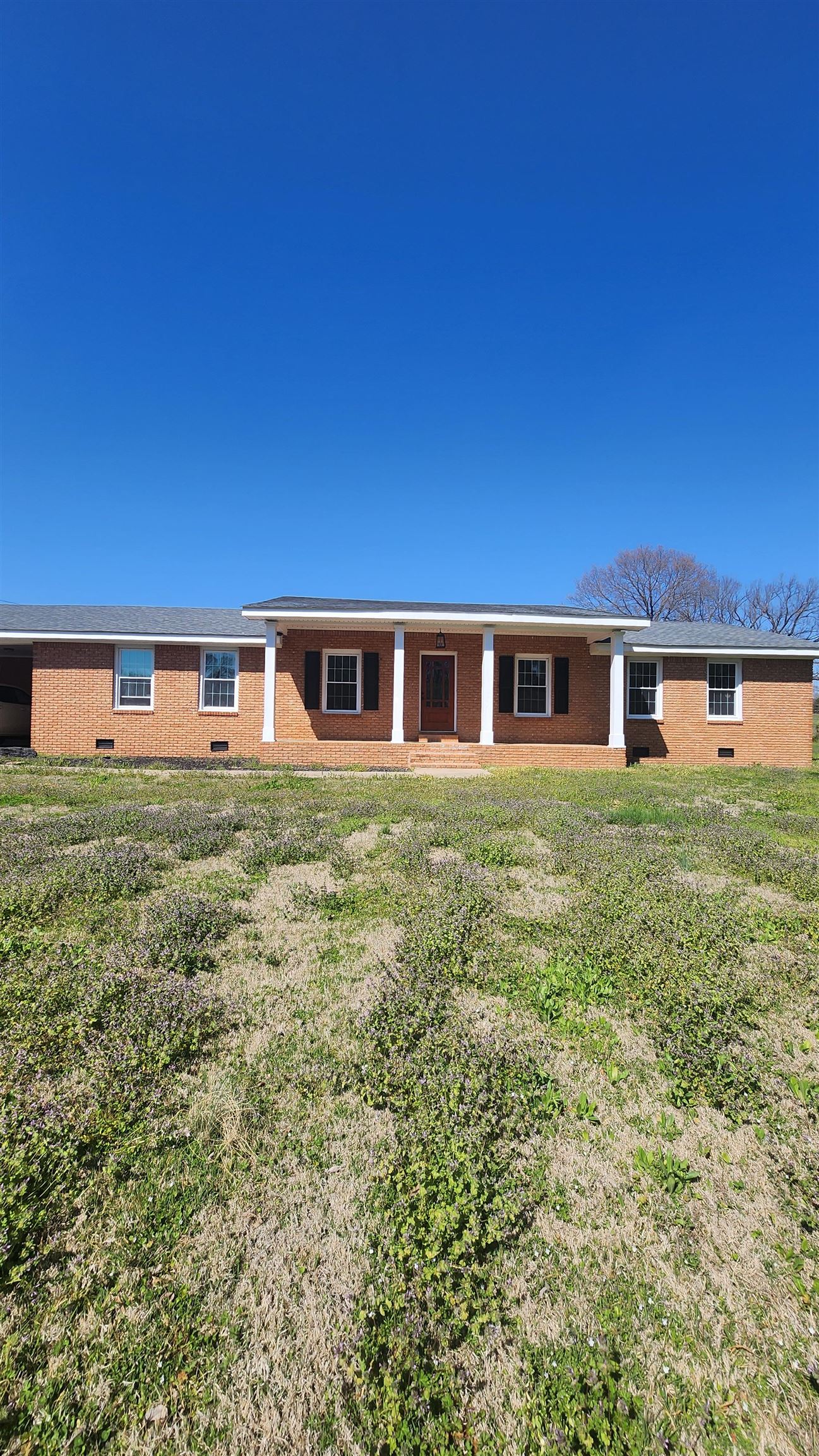 front view of house with a yard
