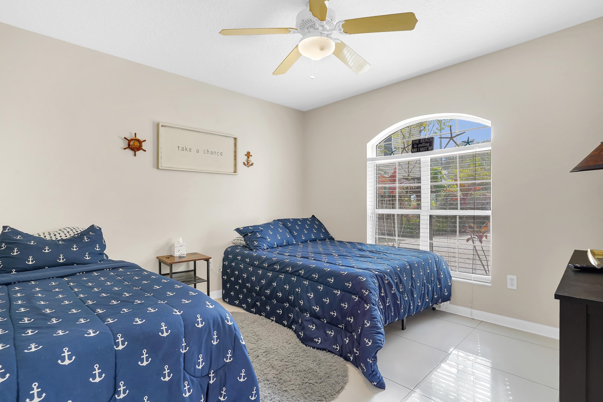 308 A Street St. Augustine, FL 32080 - Photo 30 of 46 a bedroom with bed and window