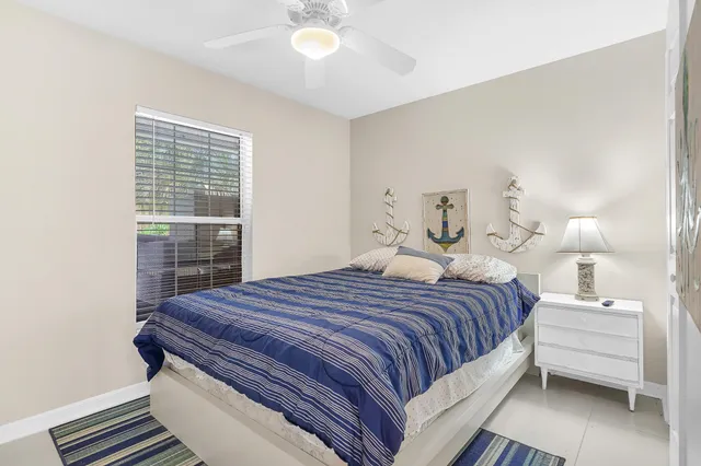 a bedroom with a bed and a cabinets