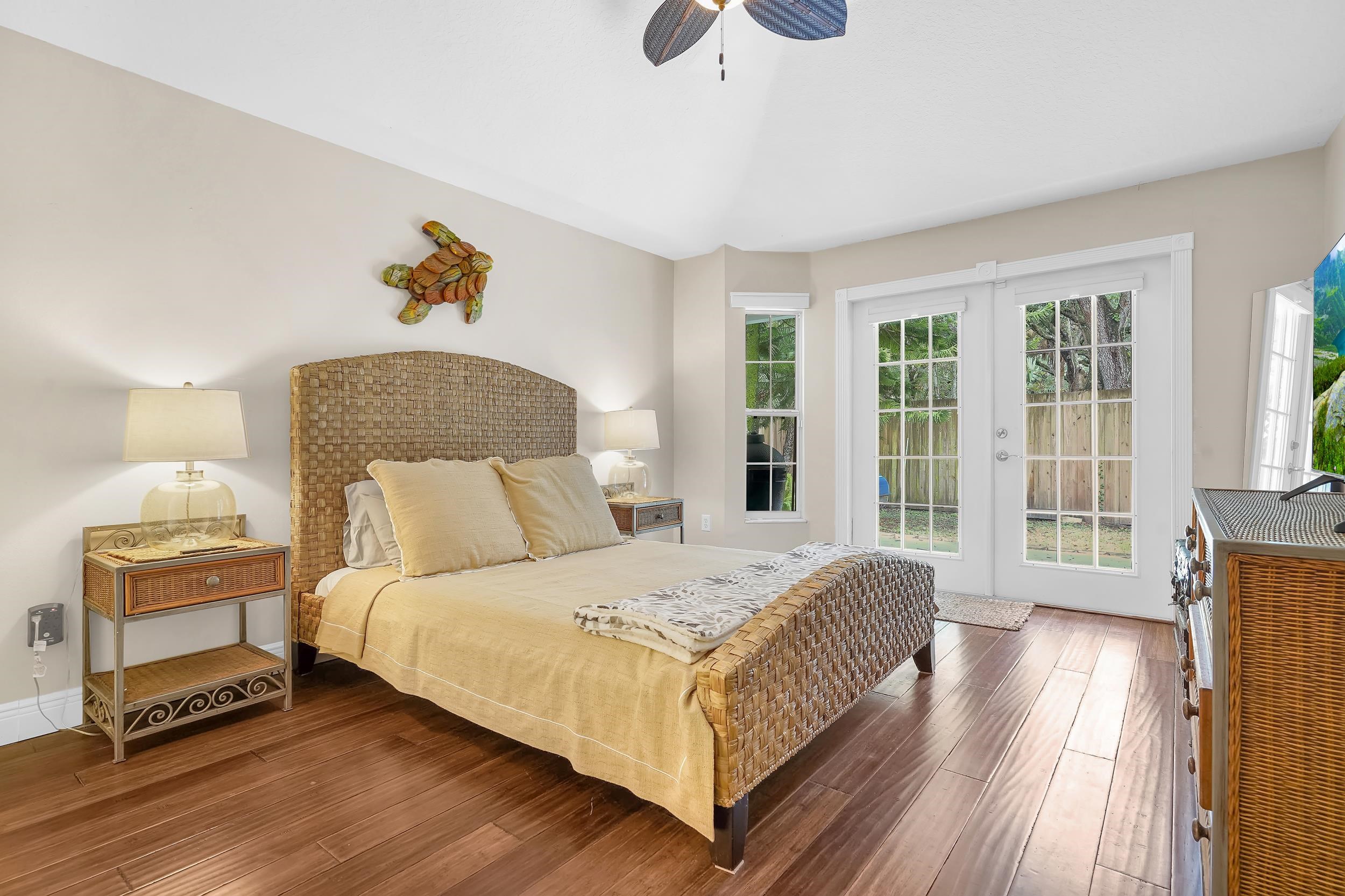 308 A Street St. Augustine, FL 32080 - Photo 38 of 46 a bedroom with a bed and wooden floor