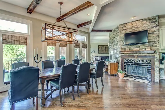 a view of a livingroom with furniture window and wooden floor