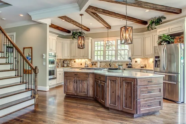 a kitchen with granite countertop a sink appliances cabinets and counter space