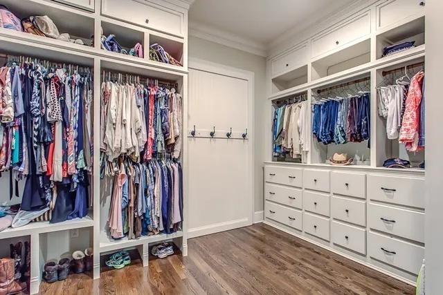a balcony with furniture and wooden floor