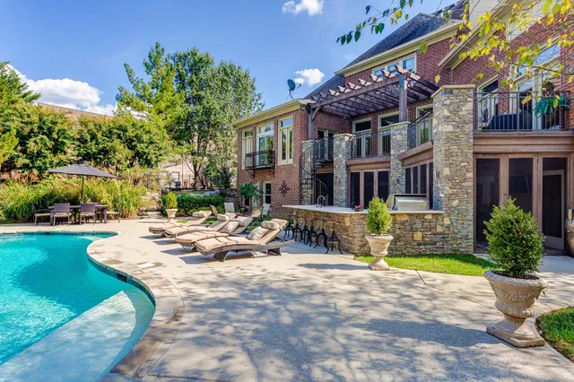 a view of roof deck with patio