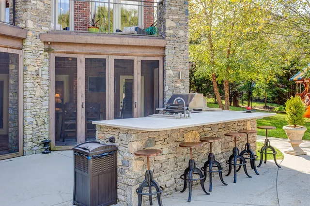 a view of a yard with patio