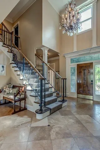 a view of entryway livingroom and hall