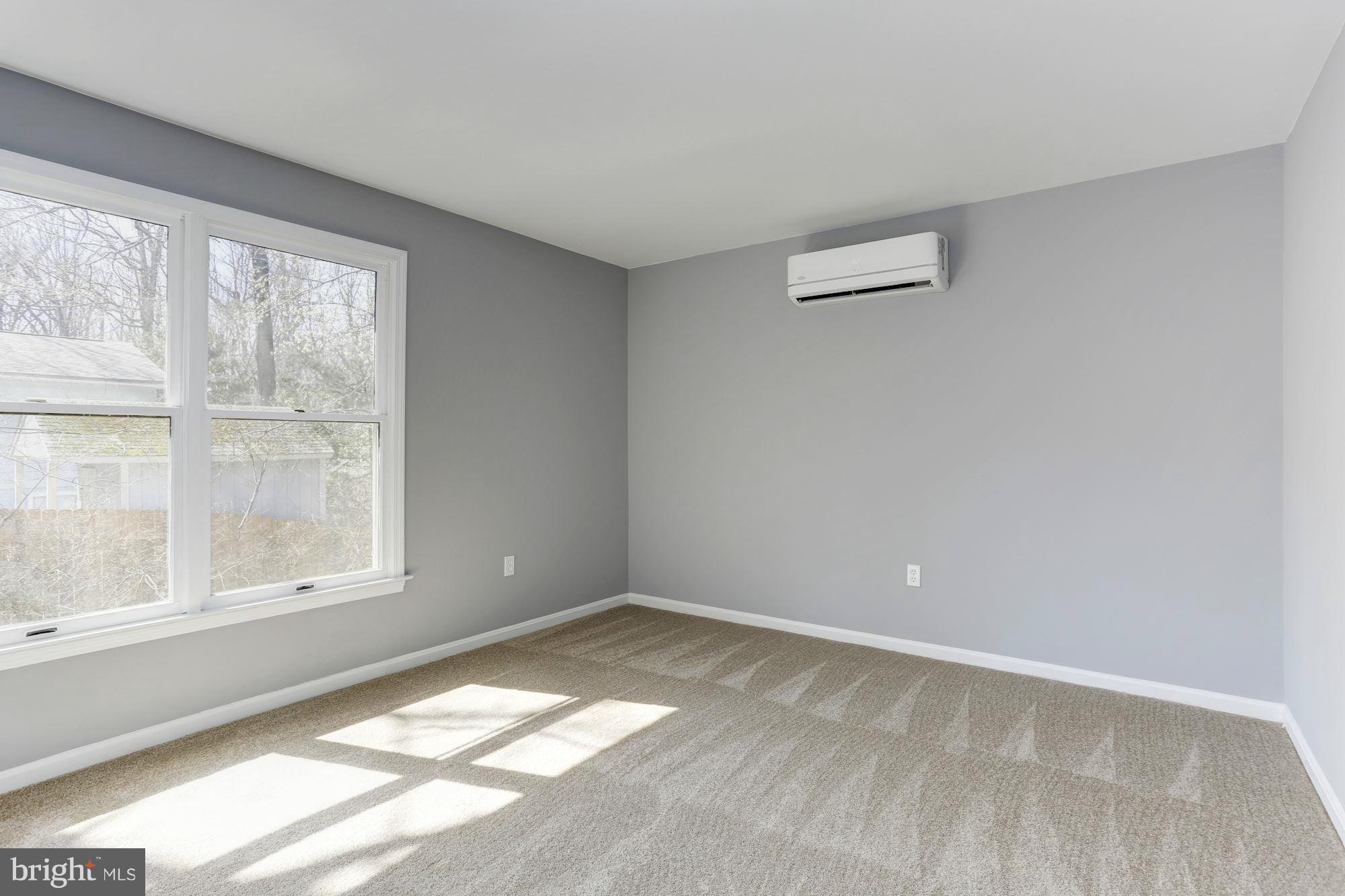 6023 Maple Road St. Leonard, MD 20685 - Photo 11 of 30 a view of an empty room with a window