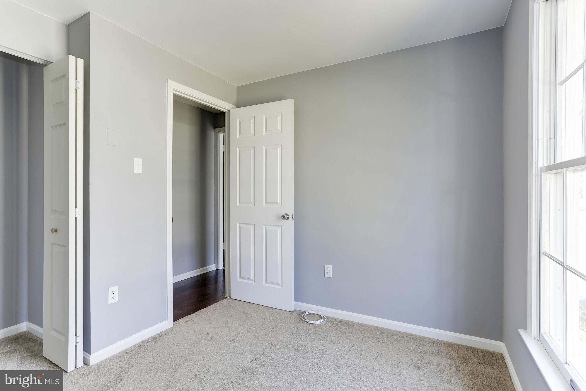 6023 Maple Road St. Leonard, MD 20685 - Photo 15 of 30 a view of an empty room and window