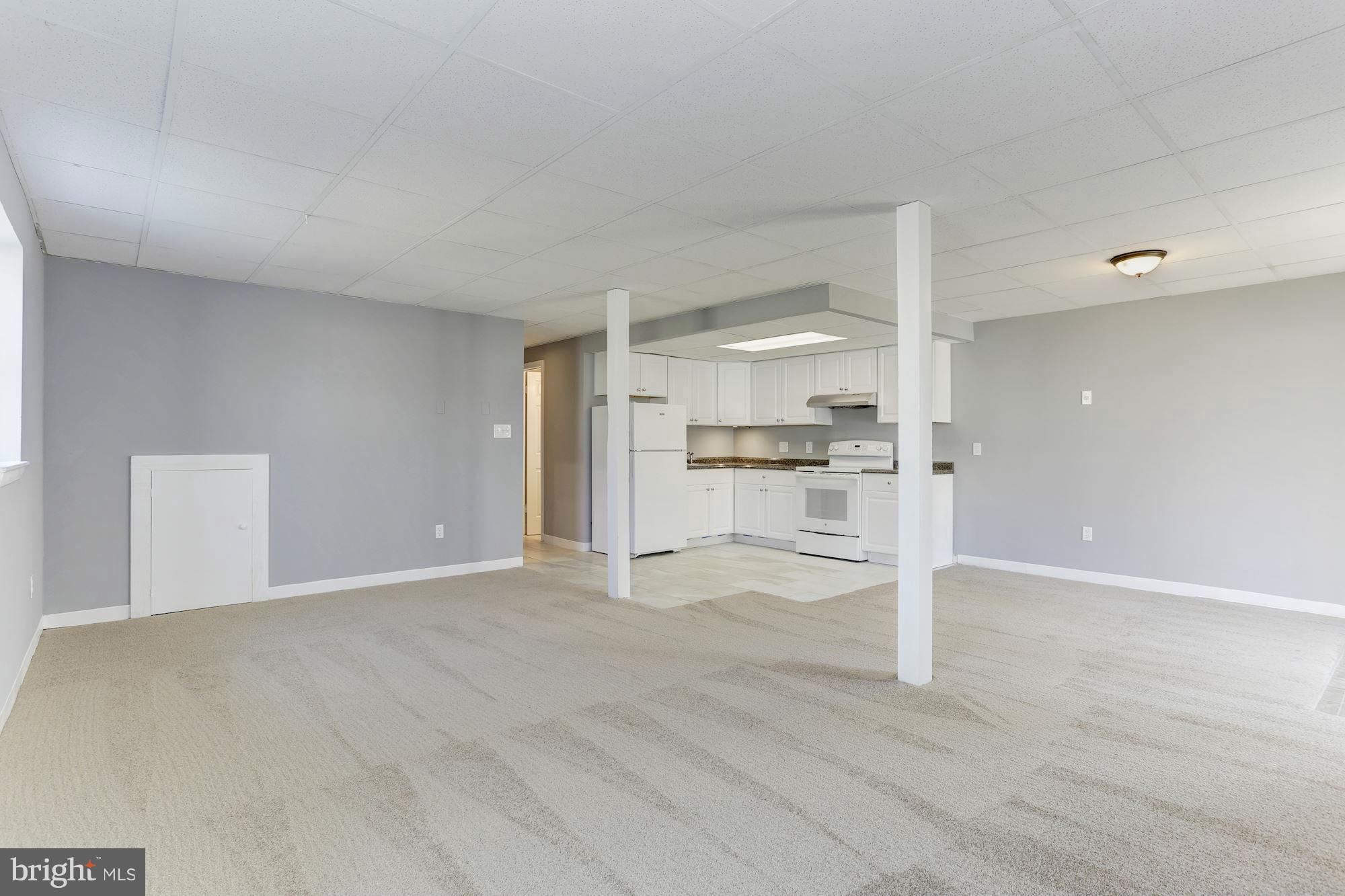 6023 Maple Road St. Leonard, MD 20685 - Photo 18 of 30 a view of a kitchen with wooden floor