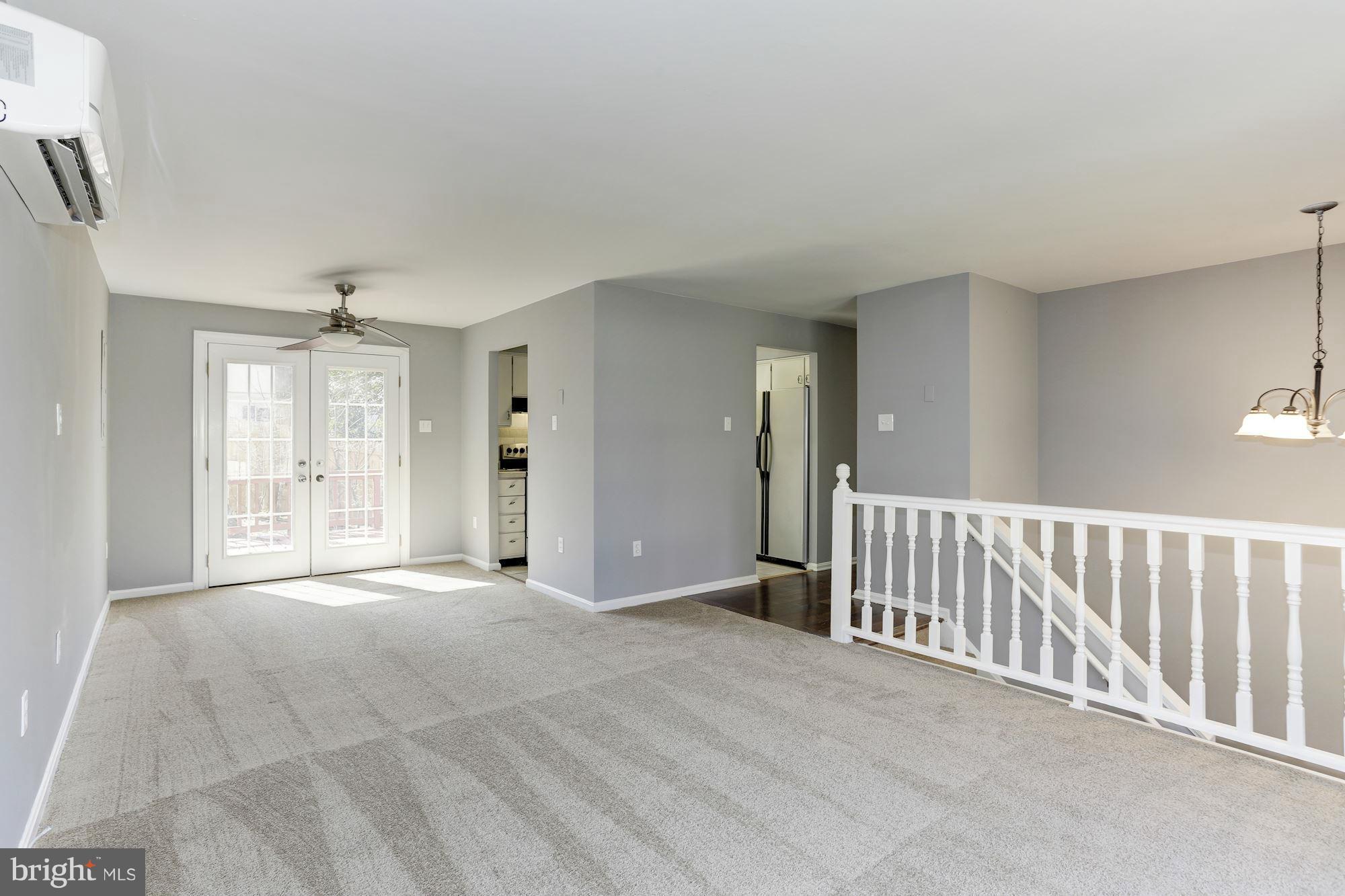 6023 Maple Road St. Leonard, MD 20685 - Photo 3 of 30 a view of an empty room with a window