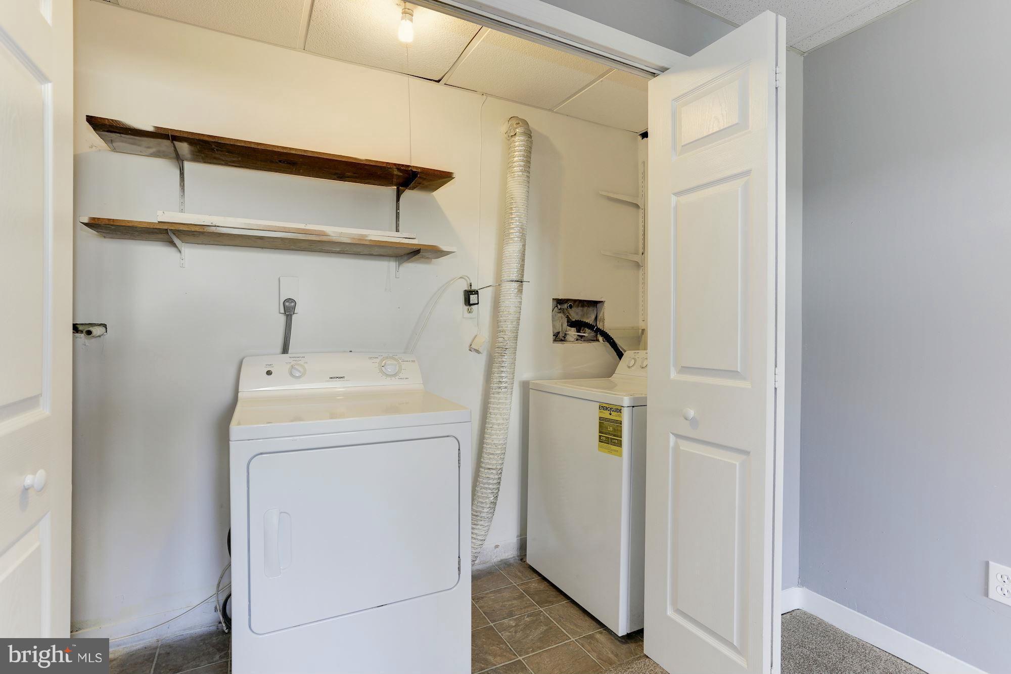 6023 Maple Road St. Leonard, MD 20685 - Photo 25 of 30 a utility room with dryer and washer