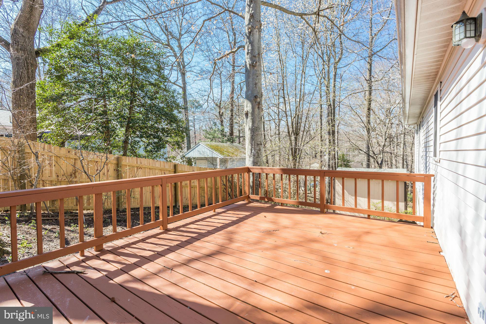 6023 Maple Road St. Leonard, MD 20685 - Photo 26 of 30 a view of wooden balcony