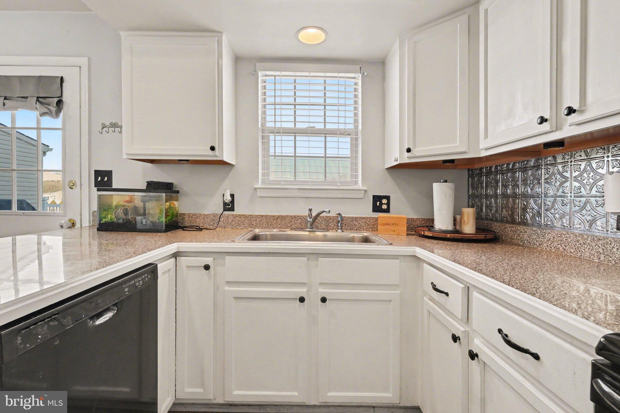 2941 Milky Way Dover, PA 17315 - Photo 11 of 26 a kitchen with white cabinets and sink