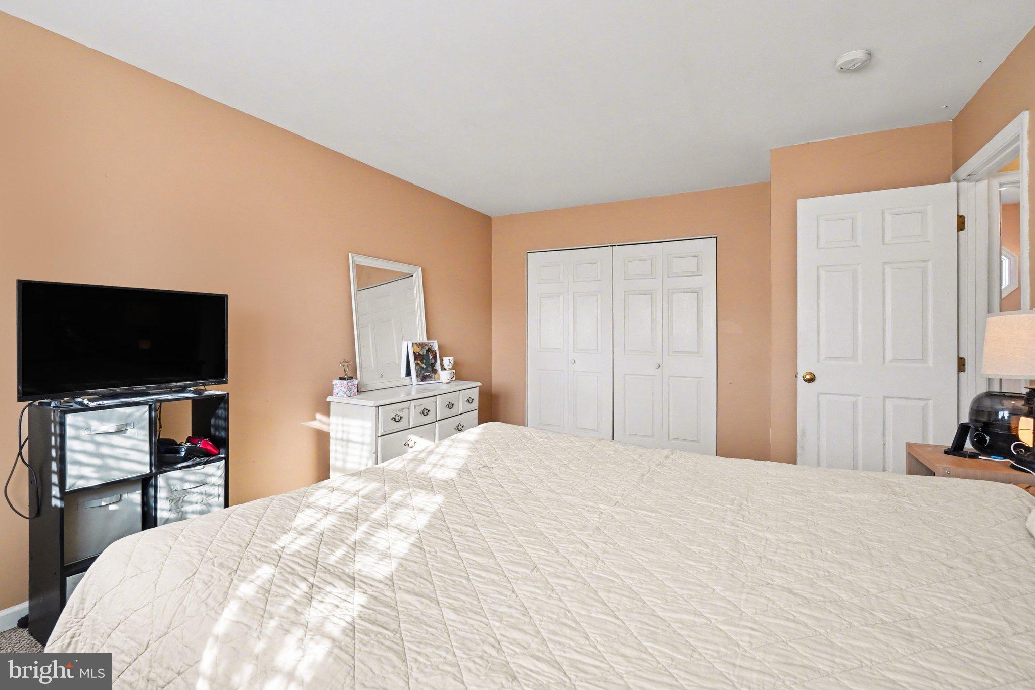 2941 Milky Way Dover, PA 17315 - Photo 14 of 26 a bedroom with a bed and a flat screen tv
