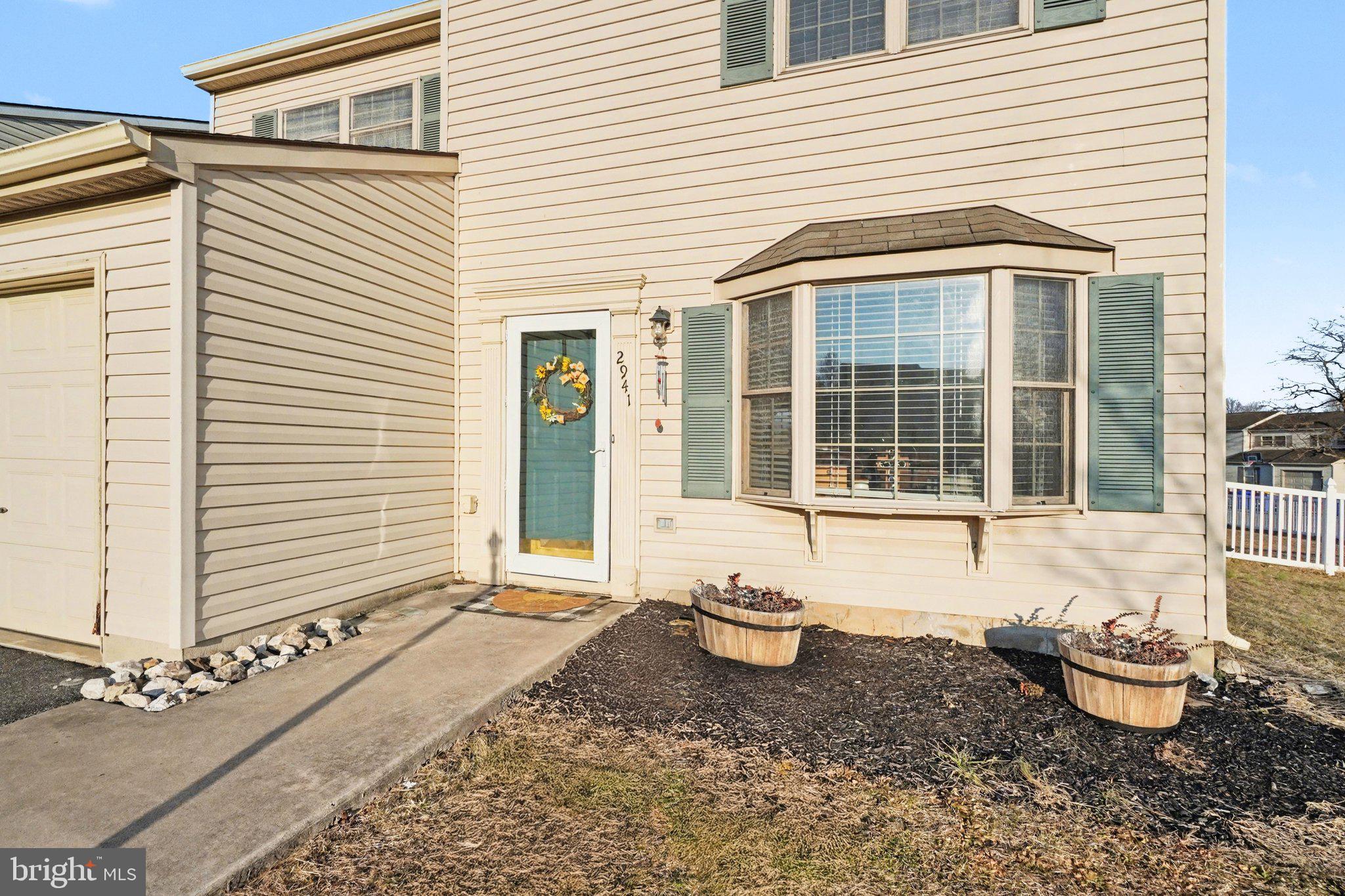 2941 Milky Way Dover, PA 17315 - Photo 3 of 26 a front view of a house with a yard