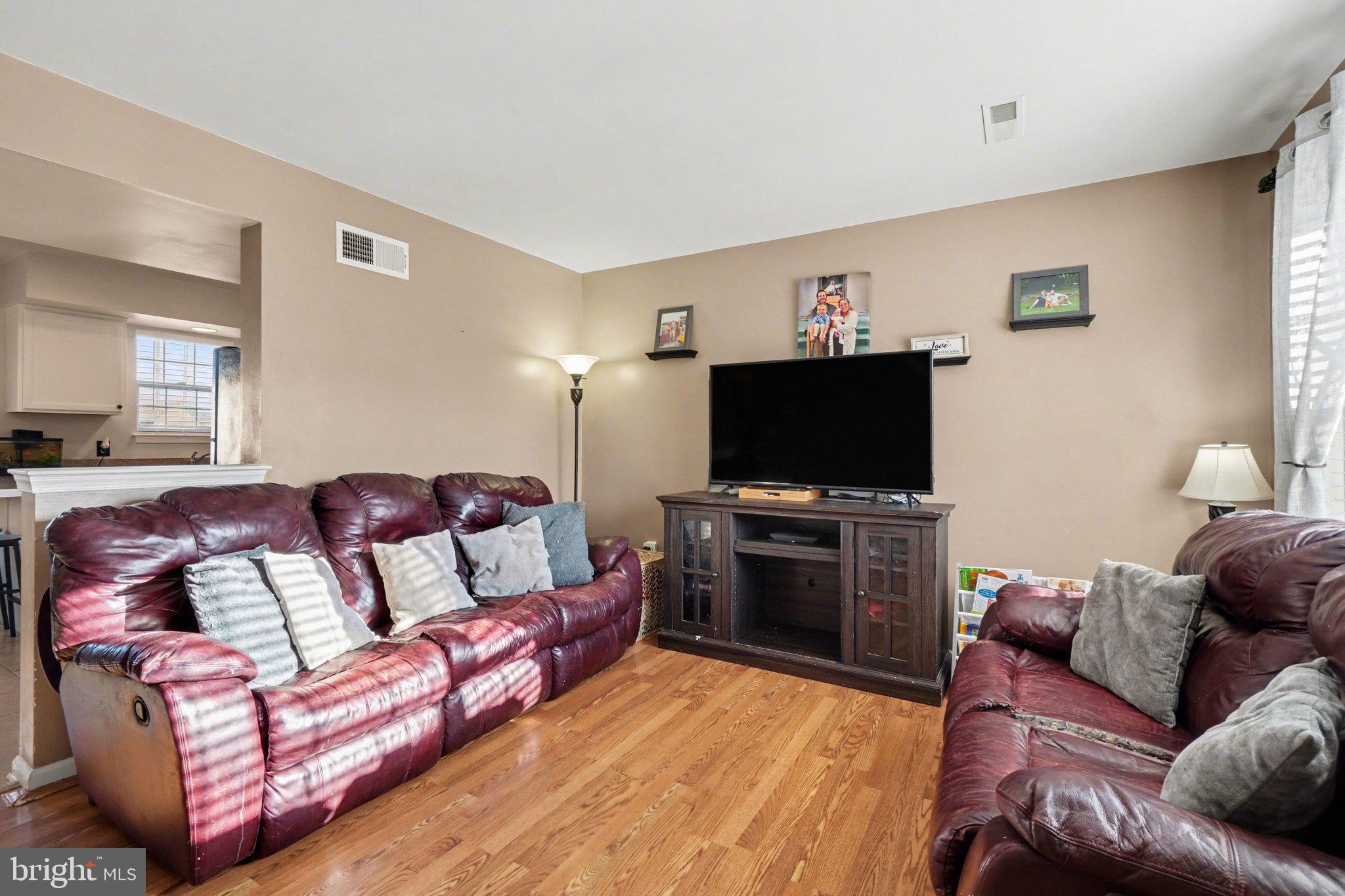 2941 Milky Way Dover, PA 17315 - Photo 4 of 26 a living room with furniture and a flat screen tv