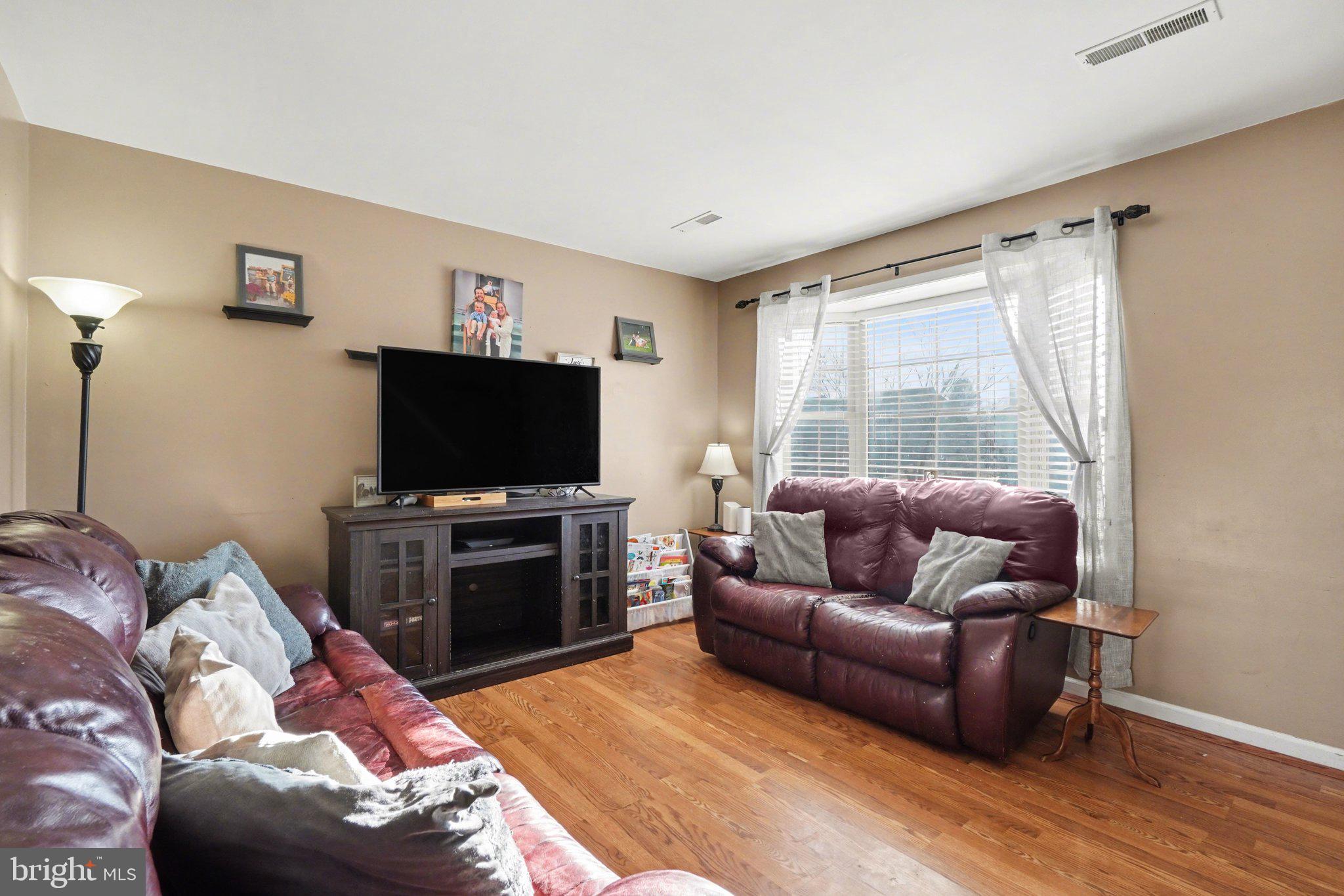 2941 Milky Way Dover, PA 17315 - Photo 5 of 26 a living room with furniture and a flat screen tv