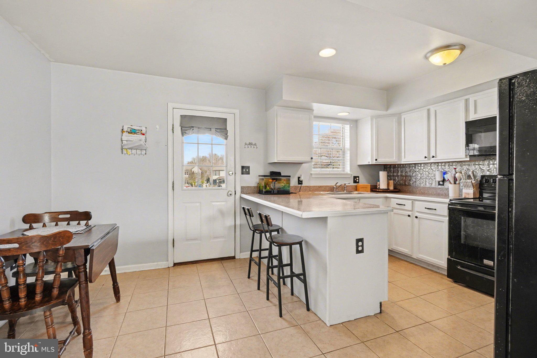 2941 Milky Way Dover, PA 17315 - Photo 10 of 26 a kitchen with a sink a counter top space and appliances