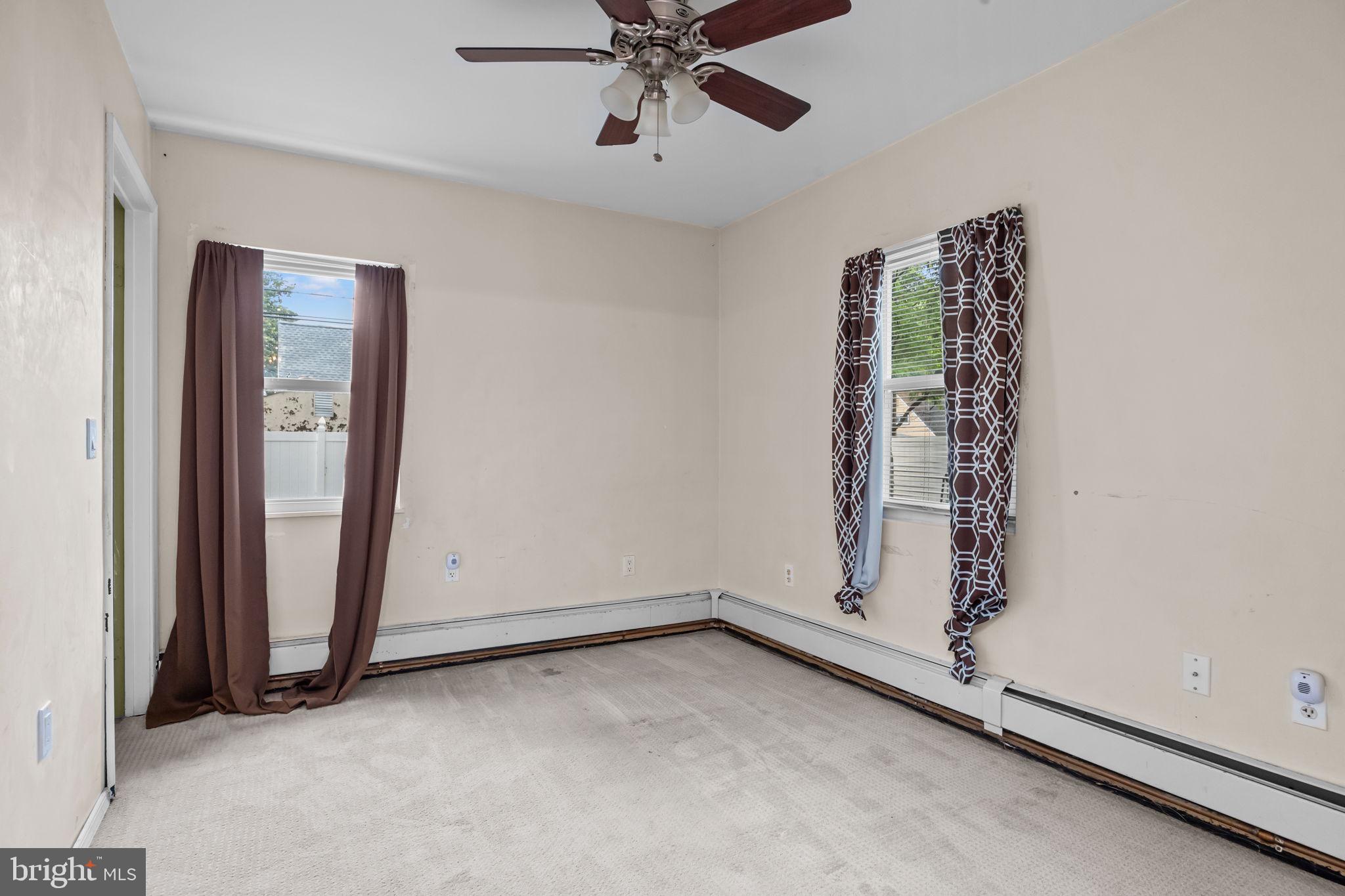 36 Grapevine Road Levittown, PA 19057 - Photo 11 of 19 an empty room with window