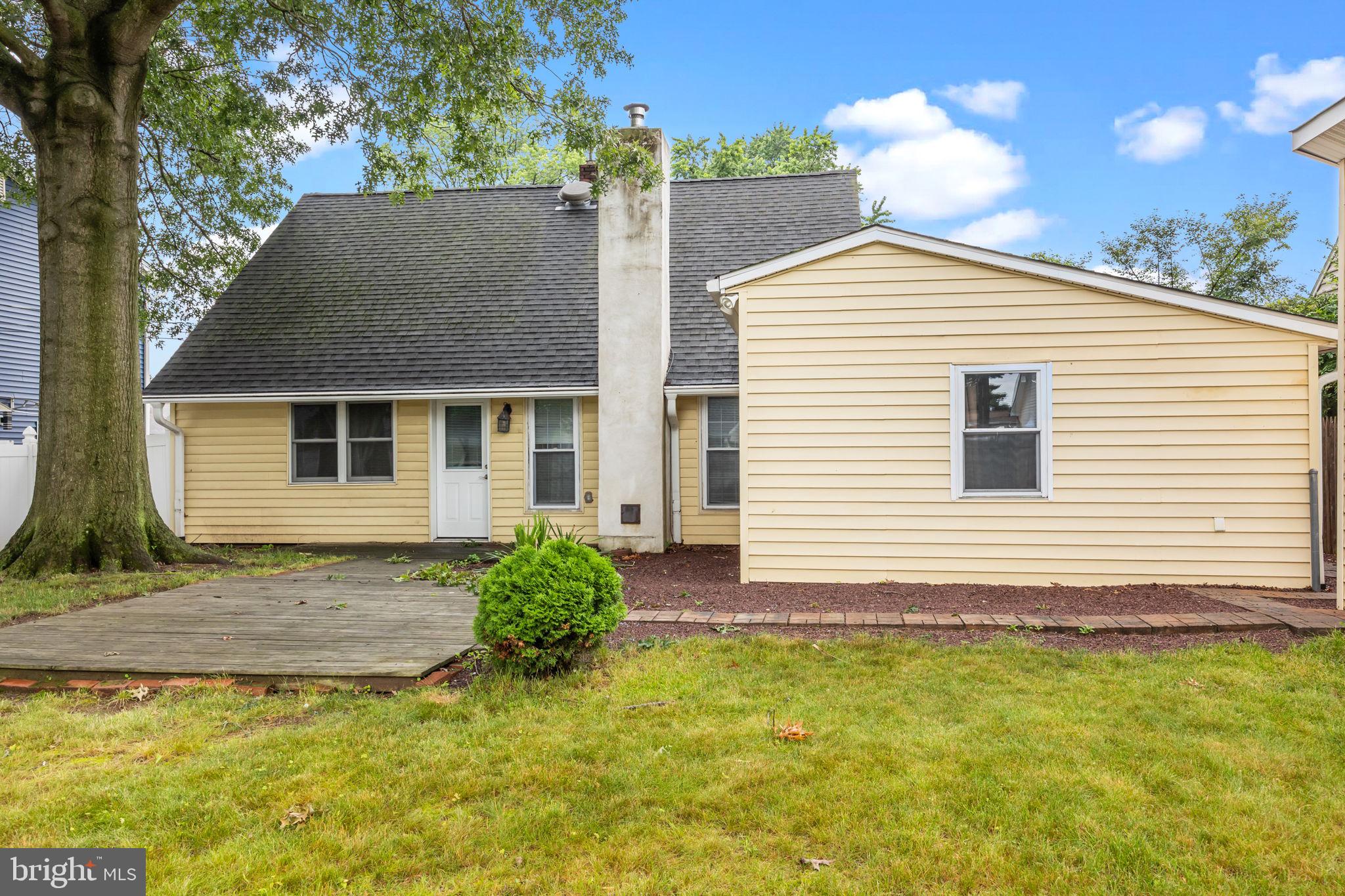 36 Grapevine Road Levittown, PA 19057 - Photo 17 of 19 a view of a house with backyard