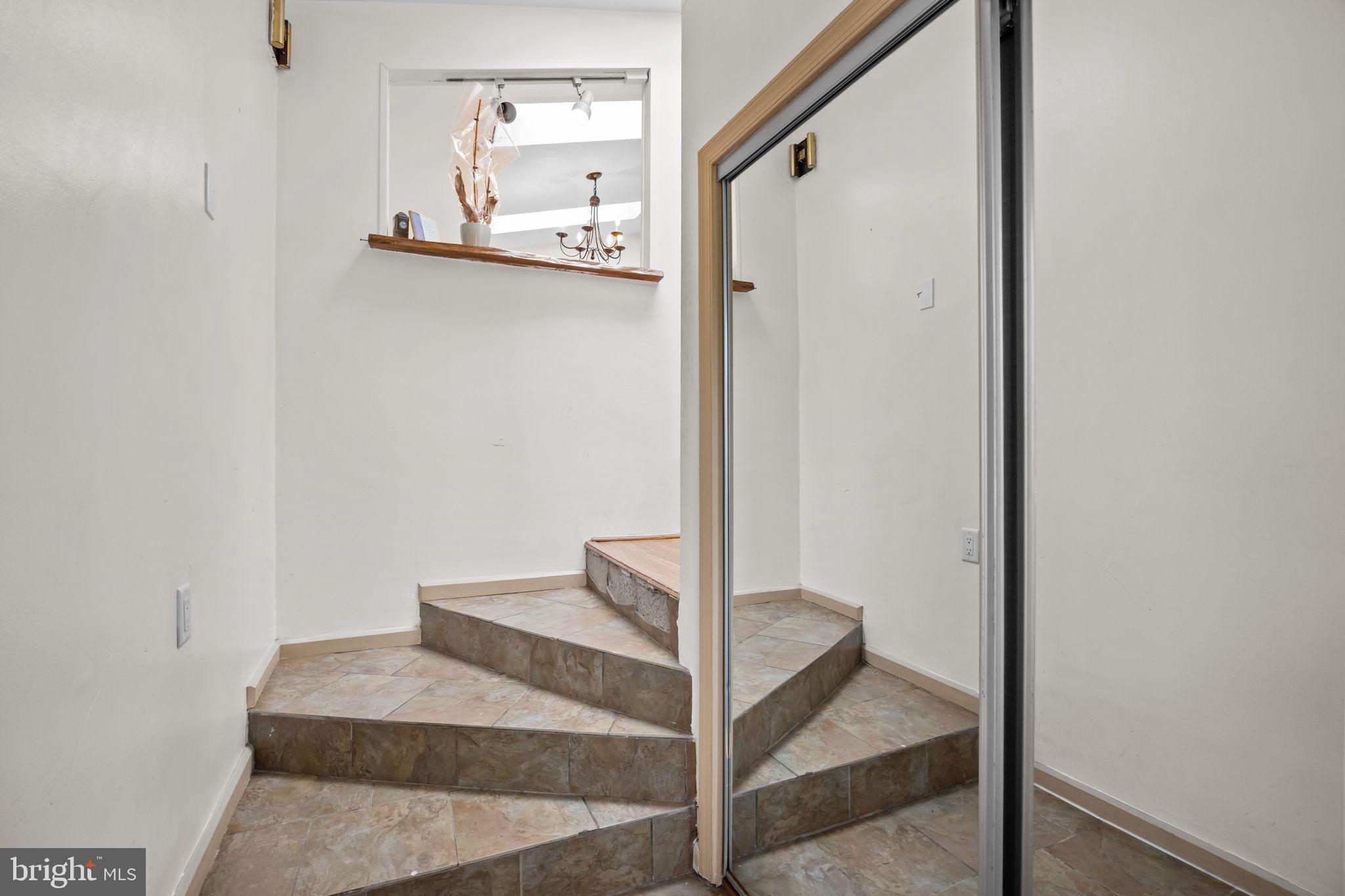 36 Grapevine Road Levittown, PA 19057 - Photo 3 of 19 a view of a hallway with elevator