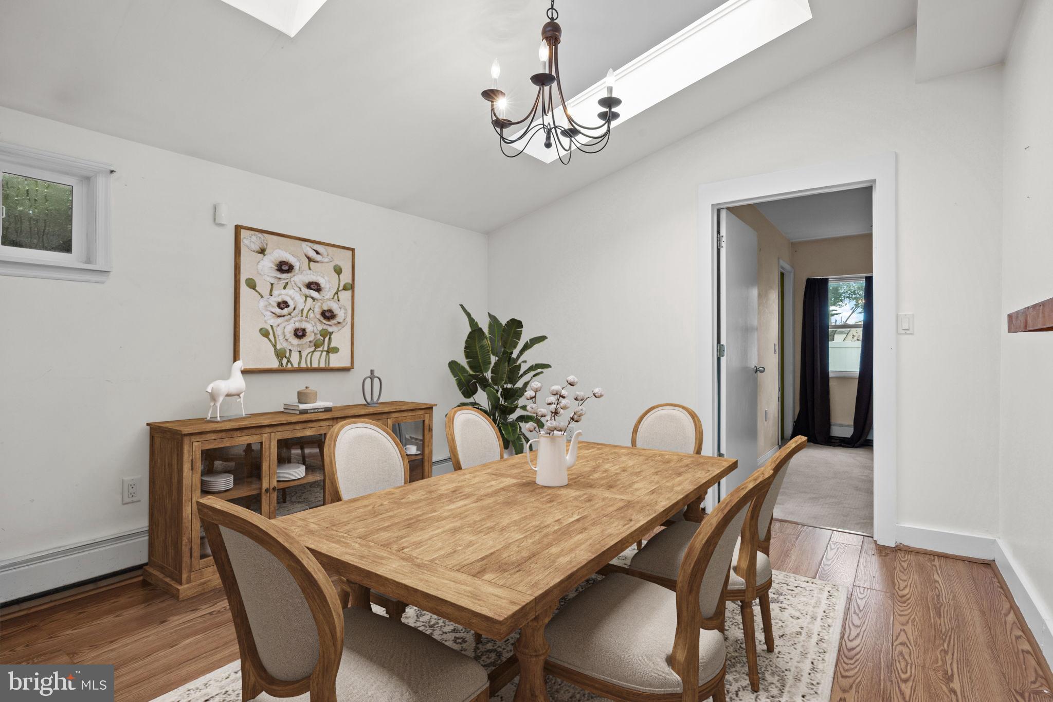 36 Grapevine Road Levittown, PA 19057 - Photo 5 of 19 a dining room with furniture and chandelier