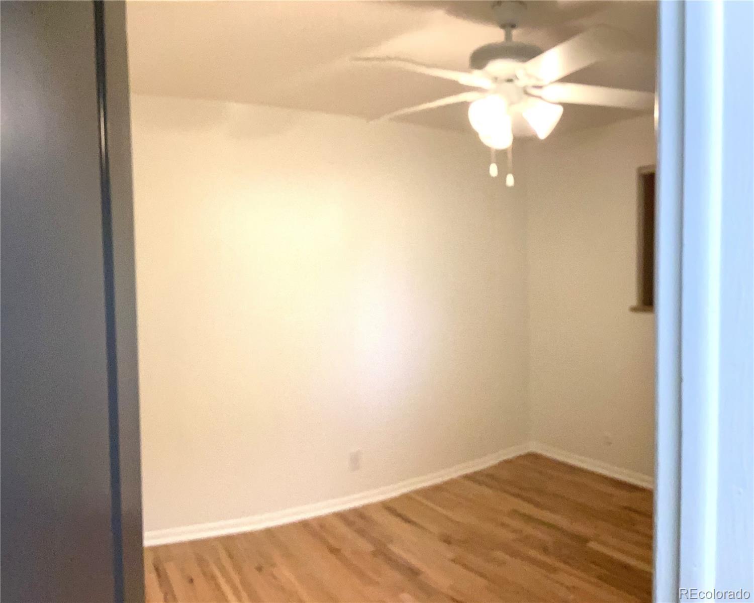 2463 South Corona Street Denver, CO 80210 - Photo 7 of 10 a view of an empty room