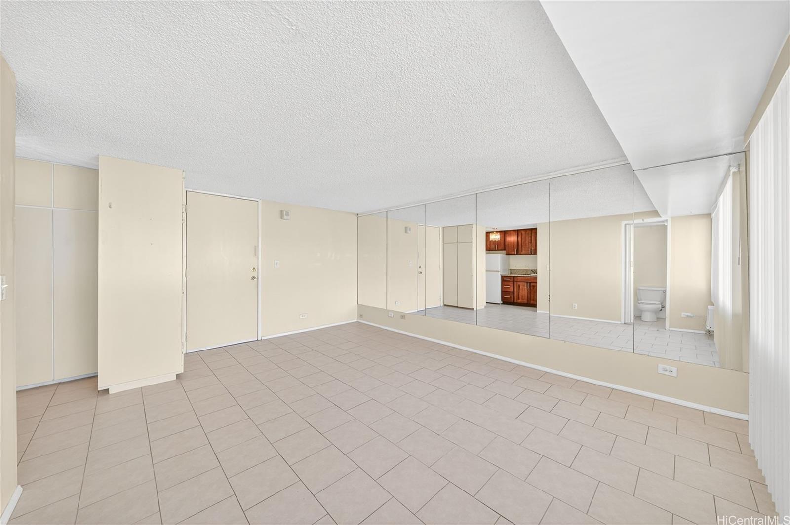 2888 Ala Ilima Street, Unit 1512 Honolulu, HI 96818 - Photo 5 of 25 a view of empty room with wooden floor