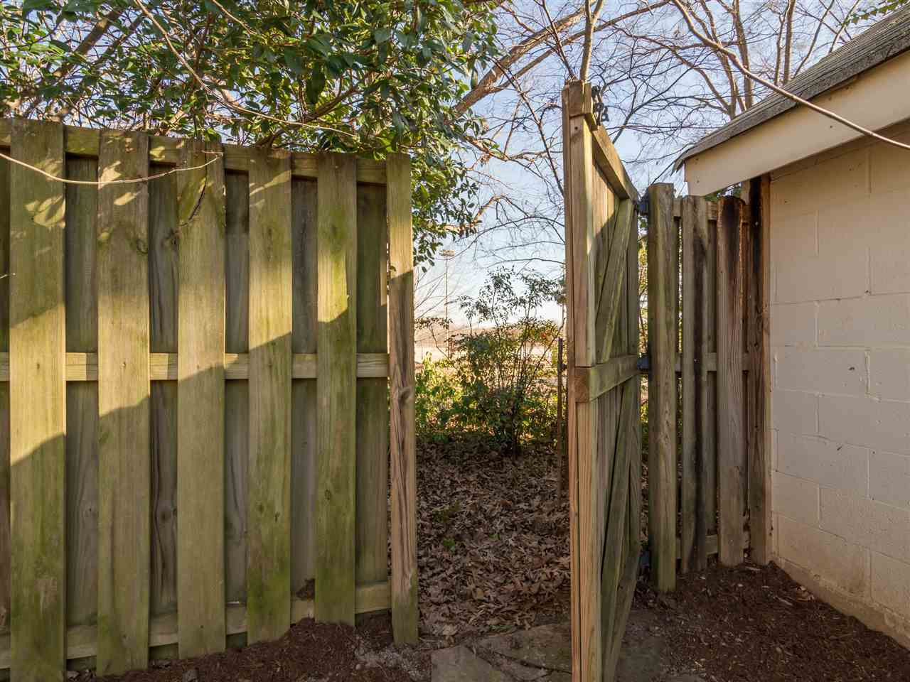 1800 Bennett Street Raleigh, NC 27604 - Photo 18 of 24 This gate. Yes, the one at the back of the yard will transport you into 40+ verdant acres of Lions Park. Tennis, basketball, ballfields, BMX track, Community Center, multiple playgrounds, and more. Incredible! Gate