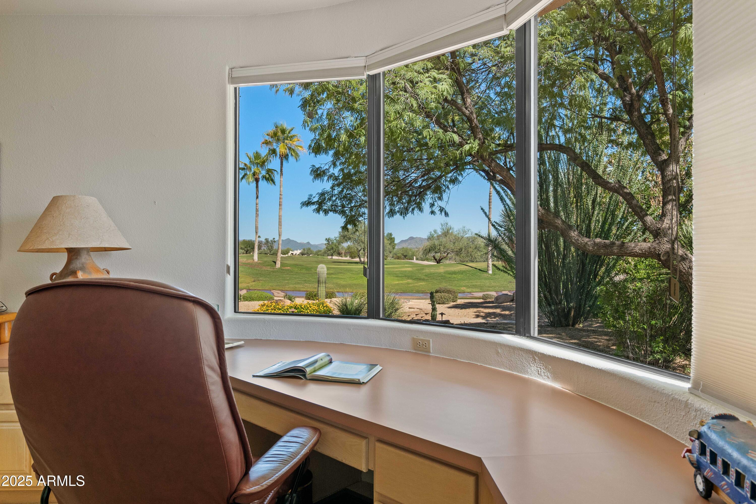 19130 East Alondra Way Rio Verde, AZ 85263 - Photo 12 of 40 a room with a large window and a bed