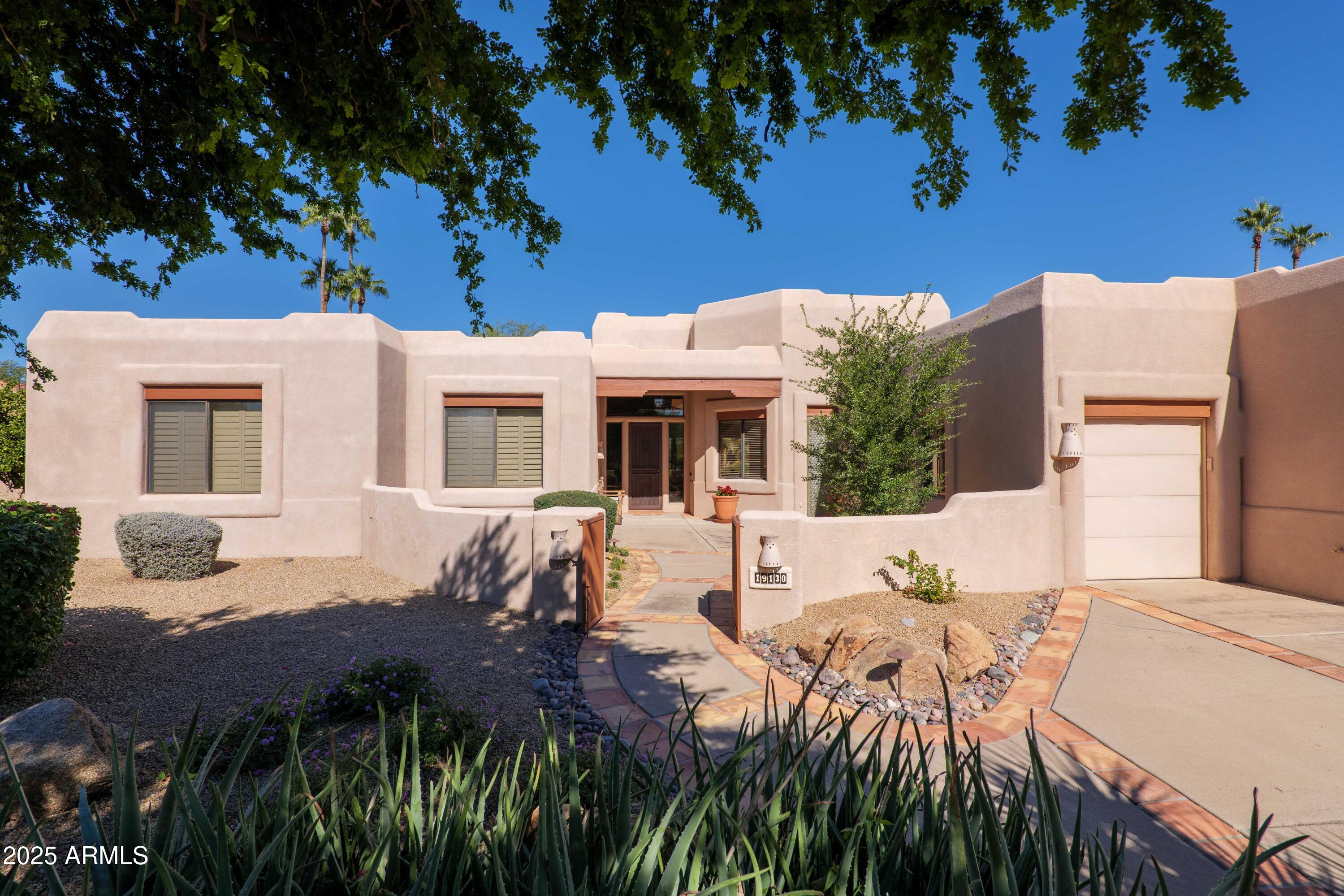 19130 East Alondra Way Rio Verde, AZ 85263 - Photo 2 of 40 a view of house with yard and seating area