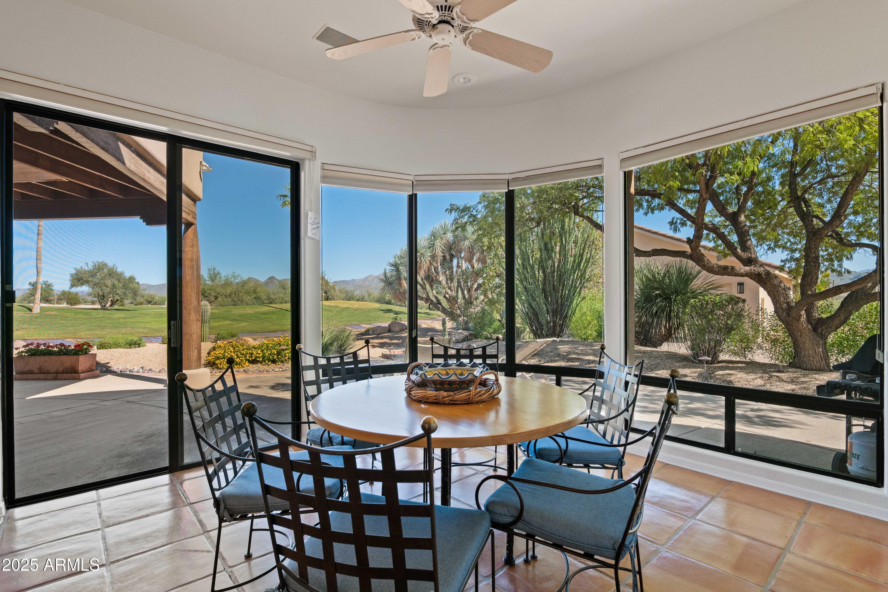 19130 East Alondra Way Rio Verde, AZ 85263 - Photo 8 of 40 a dining room with furniture water view and a ocean view