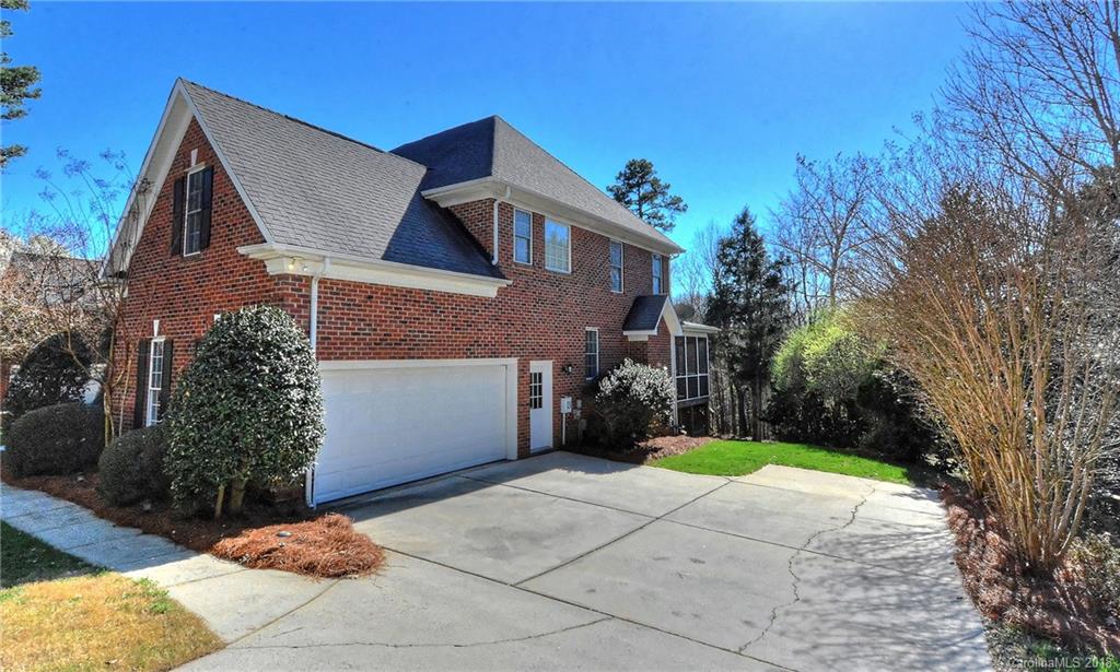3203 Planters Ridge Road Charlotte, NC 28270 - Photo 2 of 36 a view of a house with a yard and large tree