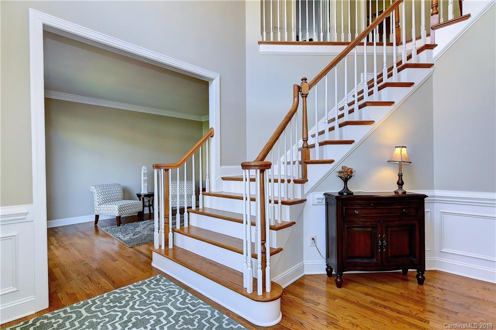 3203 Planters Ridge Road Charlotte, NC 28270 - Photo 3 of 36 a view of entryway livingroom and hall with wooden floor