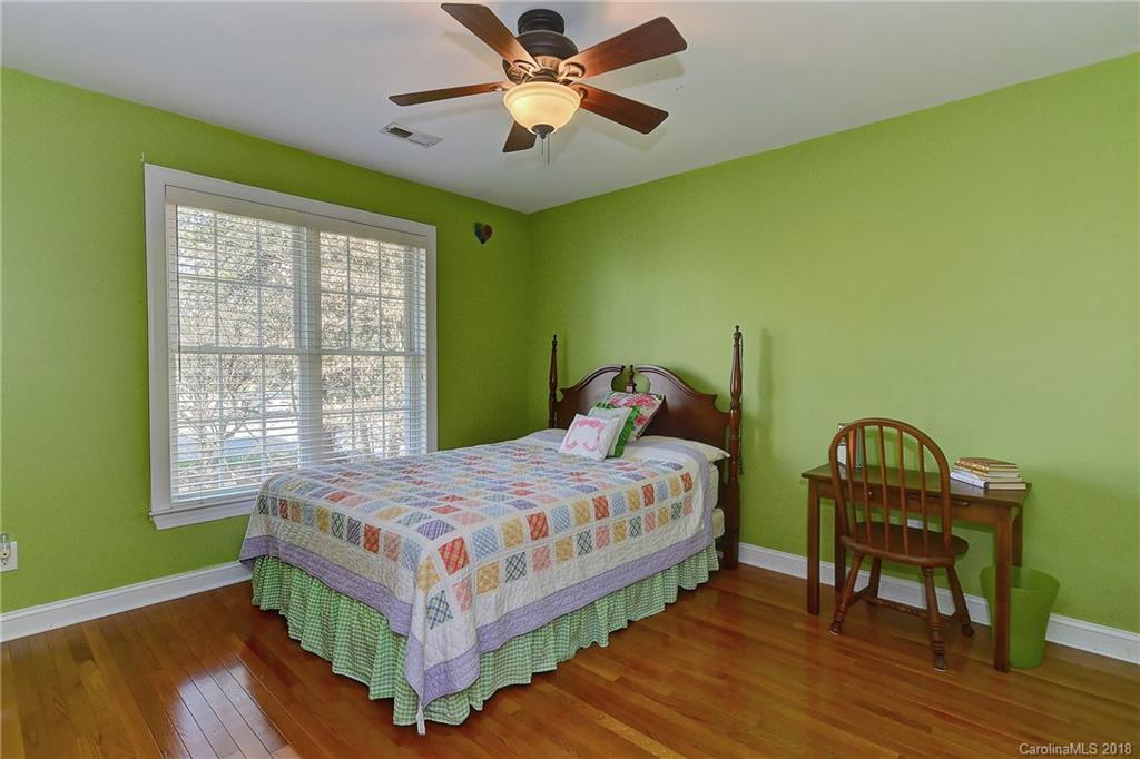 3203 Planters Ridge Road Charlotte, NC 28270 - Photo 22 of 36 a bedroom with a bed and a window