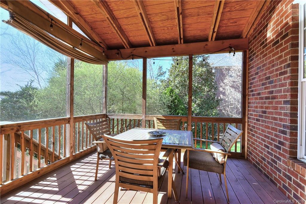 3203 Planters Ridge Road Charlotte, NC 28270 - Photo 30 of 36 a view of porch with a table and a chairs