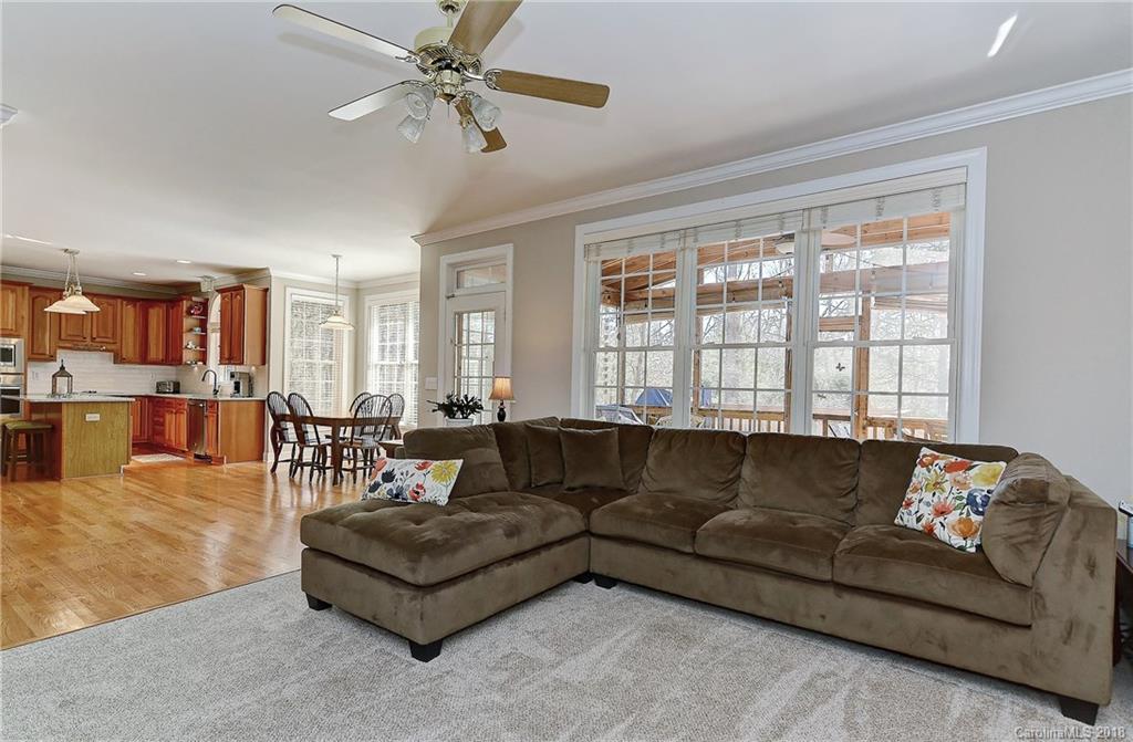 3203 Planters Ridge Road Charlotte, NC 28270 - Photo 9 of 36 a living room with furniture and a large window