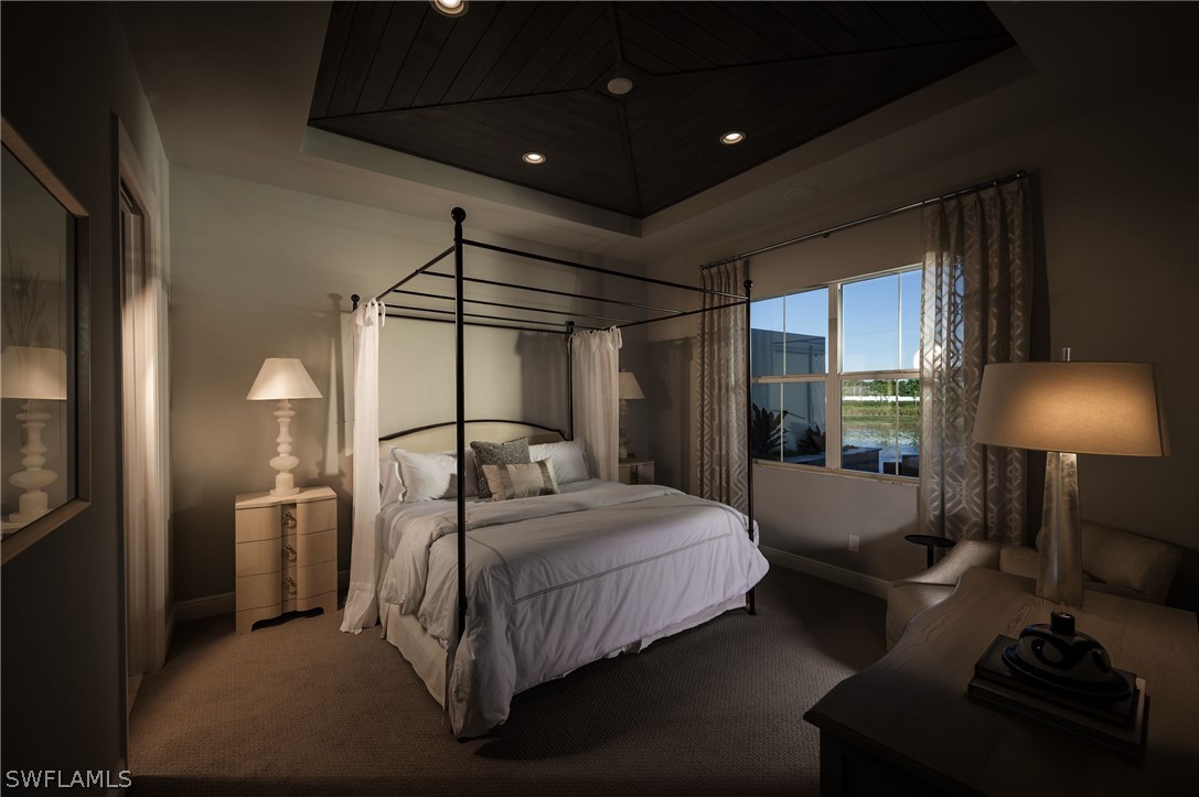 14831 Loggerhead Drive Naples, FL 34120 - Photo 7 of 10 a bedroom with a bed and a lamp