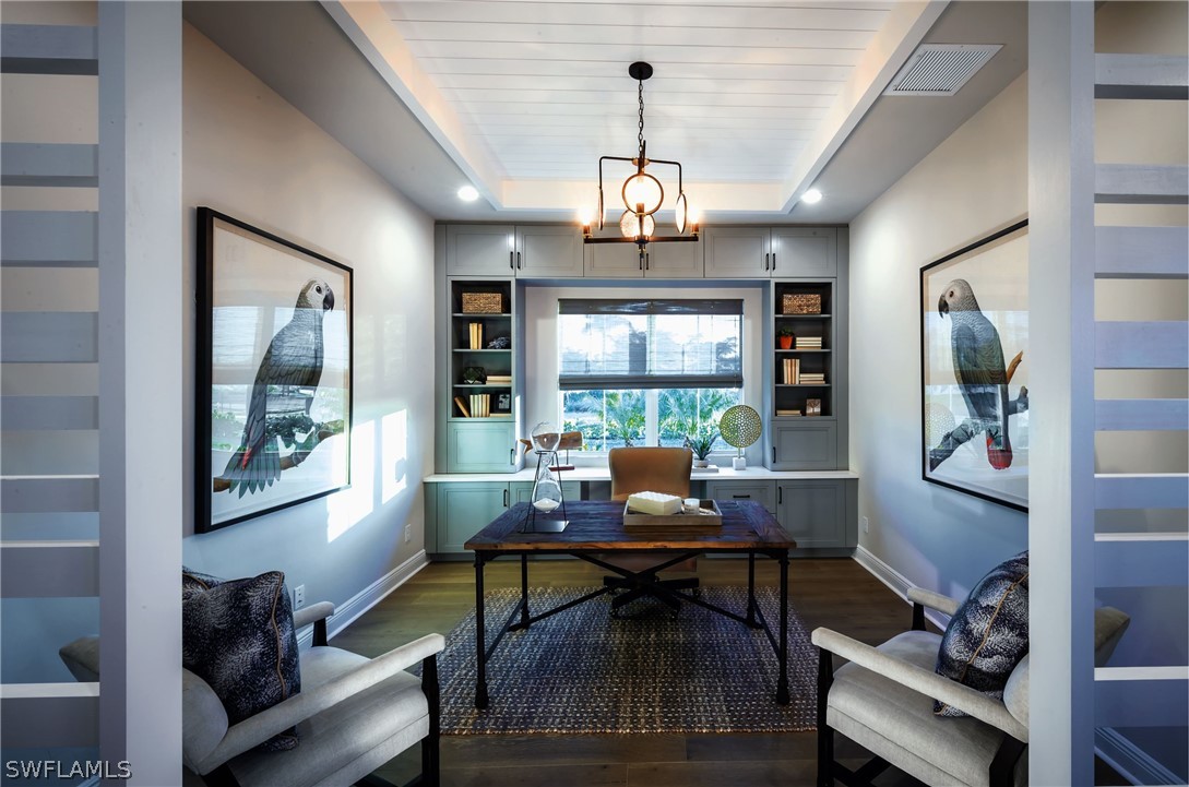 14831 Loggerhead Drive Naples, FL 34120 - Photo 10 of 10 a view of a livingroom and dining room with furniture a chandelier and window