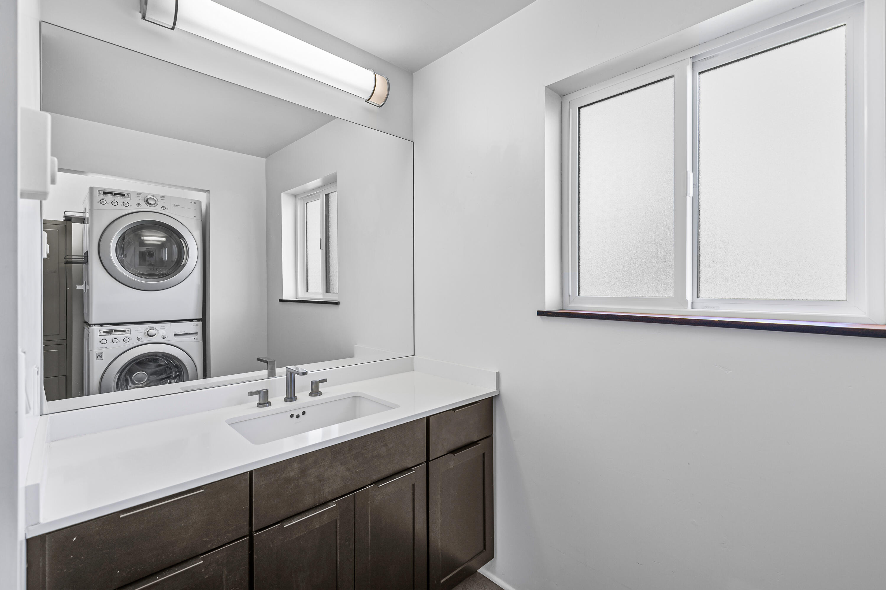 593 Crowson Road Ashland, OR 97520 - Photo 22 of 36 a bathroom with a sink and a mirror
