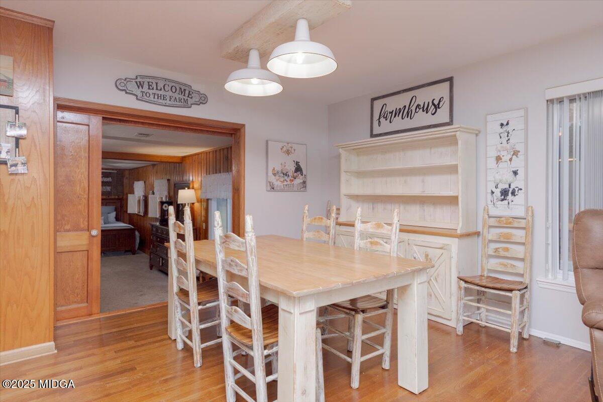 150 Moss Oaks Road Perry, GA 31069 - Photo 12 of 51 a dining room with furniture and wooden floor