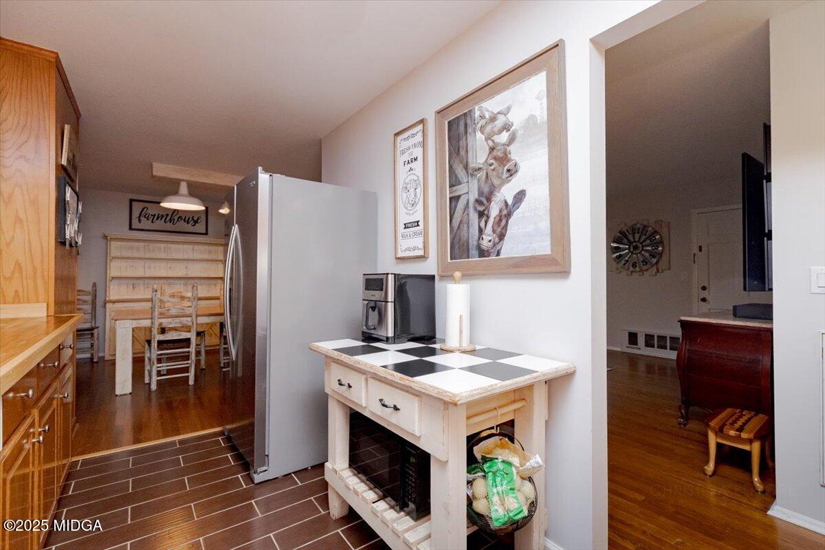 150 Moss Oaks Road Perry, GA 31069 - Photo 20 of 51 a view of kitchen with stainless steel appliances granite countertop a stove and a refrigerator